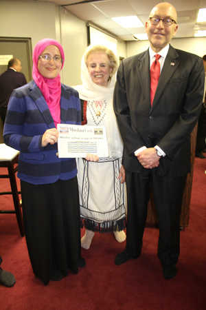 Event organizers Amira Elghawaby (CAIR-CAN) and Shano Bejkosalaj (OMWO) with Ambassador David Jacobson